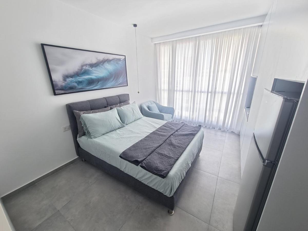 חוויה בכיכר Appartement Netanja Buitenkant foto