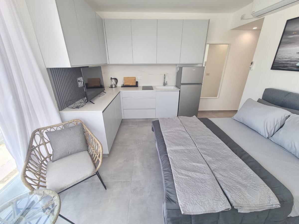 חוויה בכיכר Appartement Netanja Buitenkant foto