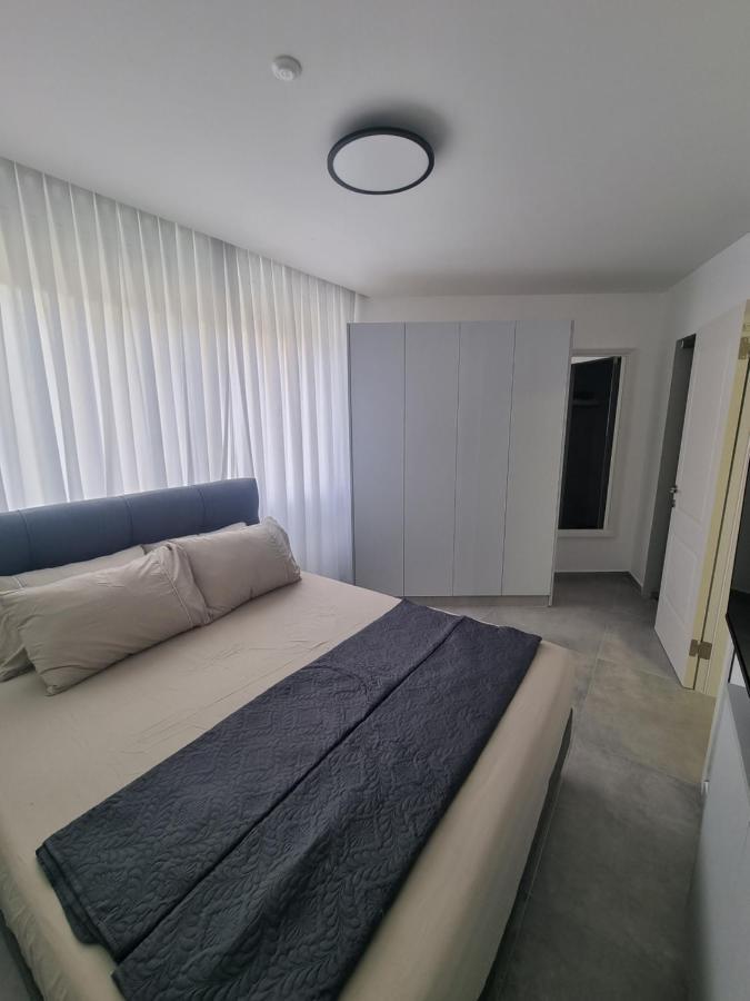 חוויה בכיכר Appartement Netanja Buitenkant foto