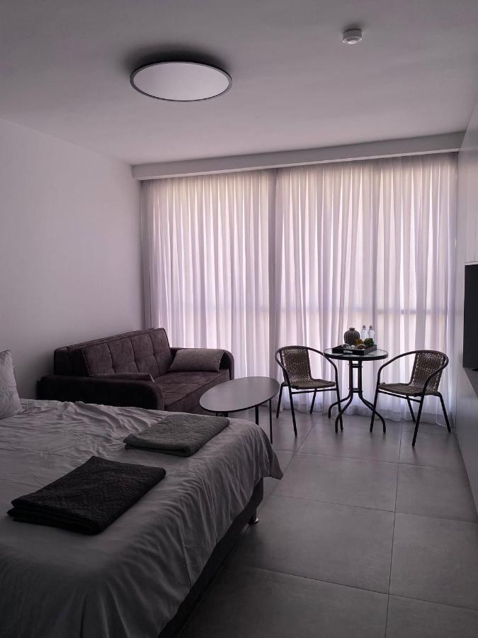 חוויה בכיכר Appartement Netanja Buitenkant foto